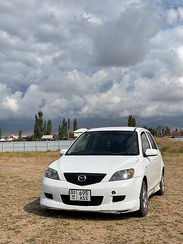 Mazda Demio: 2002 г., 1.5 л, Автомат, Бензин, Хэтчбэк