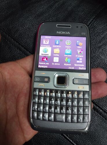 телефон 1сом: Nokia E72, Б/у, цвет - Серебристый