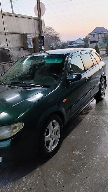 mini cooper: Mazda 323: 2001 г., 1.6 л, Механика, Бензин, Универсал — 3