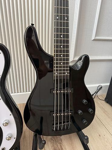 спл: - 4‑струнная модель в классическом стиле P-Bass: - Черный корпус с — 8