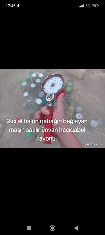 Упаковочные аппараты: Balon qablarının qapağını bağlayan maşın satılır. Əl ilə istifadə — 1