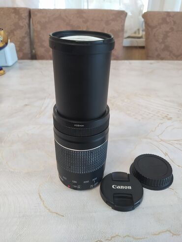 işlənmiş notbook: Canon 75-300. Hec bir problemi yoxdur. Autofocus problemsiz işleyir