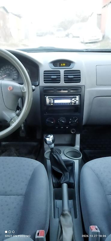 mazda 3 2006: Kia Rio: 2003 г., 1.6 л, Механика, Бензин, Седан — 4