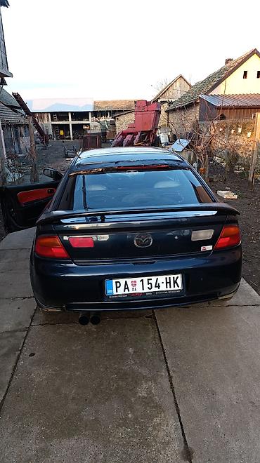 Mazda: Mazda 323: 1.5 l | 1996 г. Hečbek — 7