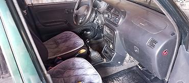 дордой мото: Daihatsu Cuore: 2002 г., 1 л, Кол менен иштөөчү, Бензин, Хетчбек — 6