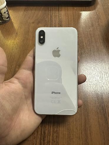 IPhone X, серебристый - Экран 5.8" Super Retina OLED, без кнопки
