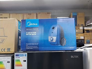 Пылесос Midea MVC14D — компактная модель с мешком для сбора пыли