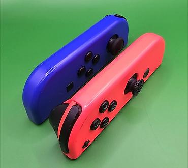 Nintendo Switch: Игровая консоль Nintendo Switch с разноцветными Joy‑Con (левый — — 5