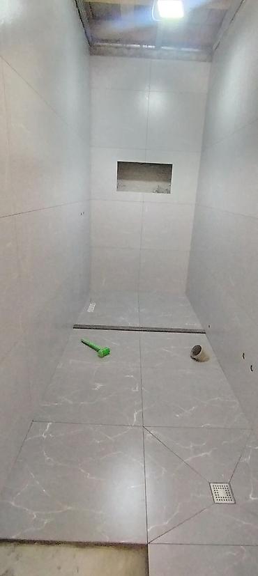 kafel ustasi: Xidmət: Kafel-metlax və duş zonası plitələmə işi Təsvir: - Hamam və — 6