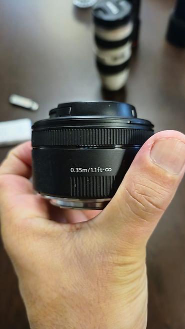 canon mf: Canon EF 50mm f/1.8 STM obyektiv - Fokus məsafəsi: 50mm (tam kadrda — 1