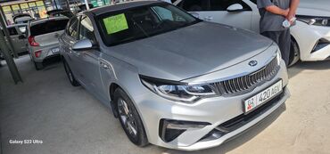 мотор коробка от хонда фит: Элегантный седан Kia K5 серебристого цвета, представленный в