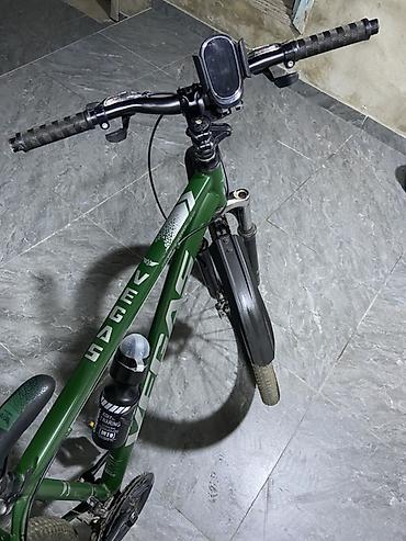 İdman velosipedləri: VEGAS markalı dağ/tur tipli velosiped. Yaşıl rəngli çərçivəyə malikdir — 1