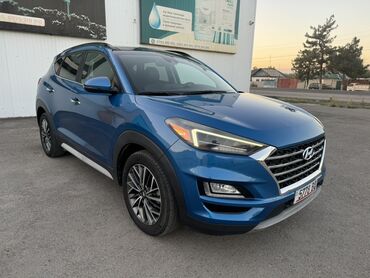 срочно продаю электро скутер: Внедорожник Hyundai Tucson синего цвета. Автомобиль оснащен стильными