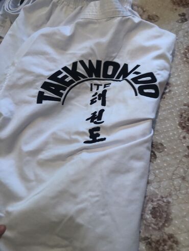 Спортивная форма: Комплект экипировки для тхэквондо ITF. В составе: - 1 кимоно ITF с — 7