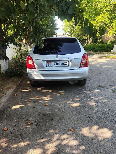 Mazda Familia: 2003 г., 1.6 л, Механика, Бензин, Универсал — 3