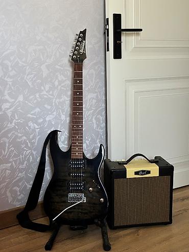Gitaralar: * Marka: Ibanez * Tip: Elektro gitara * 3 pikap: H–S–H quruluşu — iki — 5