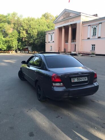 кундай гетс: Продается Hyundai Elantra серого цвета. Автомобиль оснащен люком