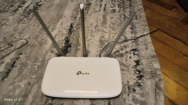adsl wifi modem router: Tp link WR845N Router Yaxsi vəziyyətdədir. Hec bir problemi yoxdur