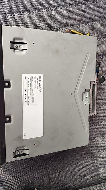 Магнитолы: Автомагнитола Kenwood U300R (1-DIN) - Совместимость: 1-DIN, питание — 2