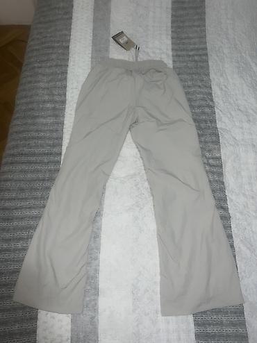 vikend torba: Nike Sportswear Collection Women's Mid-Rise Repel Zip Trousers vel. XS — 8