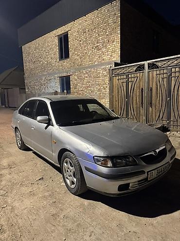 audi 100: Mazda 626: 1997 г., 1.8 л, Механика, Газ, Седан — 1