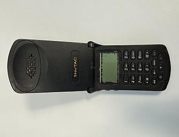 ericsson t28: Motorola StarTAC mobil telefonun kabrosu, batareyası, adapterı və — 5