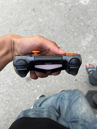 rdr 2 disk: Sony DualShock 4 (PS4) oyun qolundan - Model: Sony DualShock 4 — 1