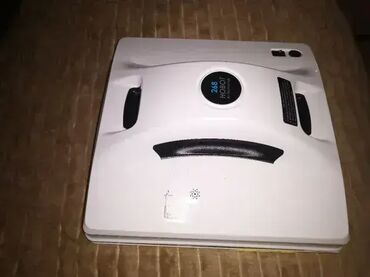 Robot usisivači: Lepo ocuvan. Nemam punjac. Kad se ukljuci signalizira zelenu lampicu — 1