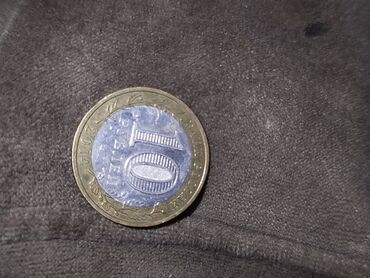 спортивное оборудование: Памятная биметаллическая монета Банка России «Тюменская область» из