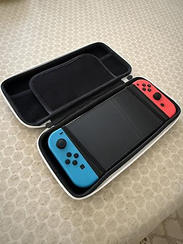 nintendo switch oled 4pda: В комплекте ещё идет зарядка и игра Zelda и FIFA 23 и кейс — 1