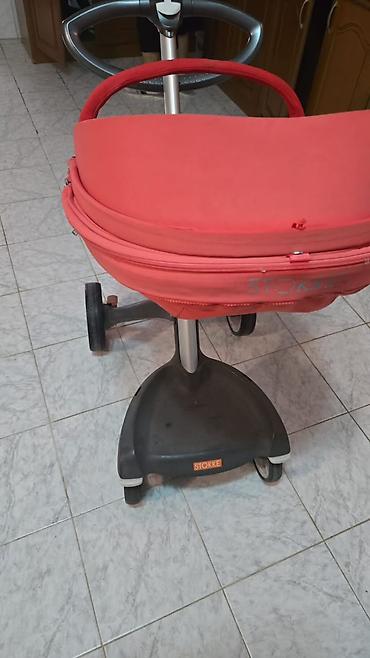 usag maneji: Stokke uşaq arabası satılır. Parlaq qırmızı rəngdə olan bu model — 3