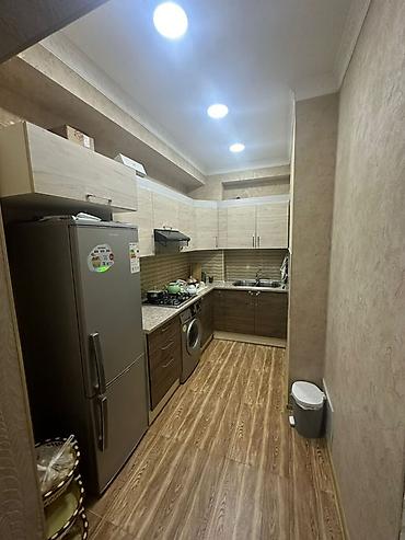 binede: 🏢 16 mərtəbəli yeni tikili binanın 11-cü mərtəbəsi 🛏️ 2 otaq 📐 60 kv.m — 1