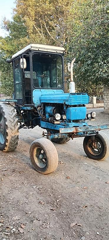 215 75 16 c: Traktor – mavi rəngli, kabinalı, arxa təkərli çəkici - Model tipi — 1