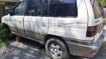 Стекла и комплектующие: Переднее левое Mazda, 1996 г., Б/у, Оригинал — 2