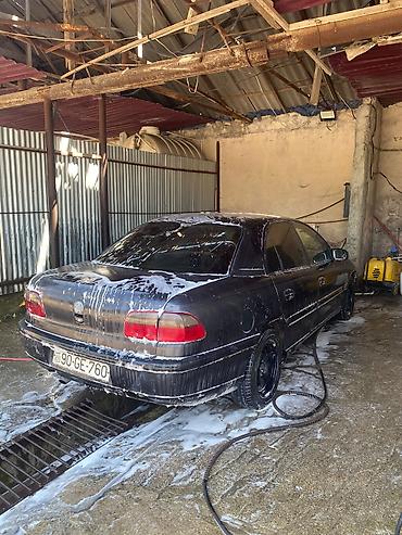 maşin siqnali: Opel Omega: 2 l | 1994 il 42500 km Sedan — 6