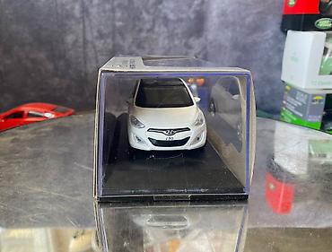 Avtomobil modelləri: Коллекционная модель Hyundai i30 5 door white 2012 Pino B&D Scale — 2