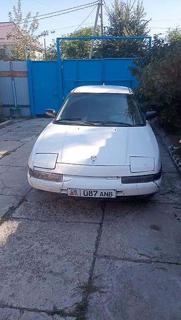Транспорт: Mazda 323: 1990 г., 1.6 л, Механика, Бензин, Хэтчбэк — 1