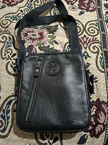 кожаные кошельки: Мужская барсетка из натуральной кожи. Стиль, практичность и надёжность — 3