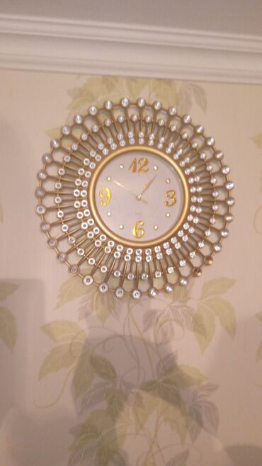 dekorativ divar saatlari: Divar saati satilir.qimet 20 manat sondur 1 ay istifade olunub satilir