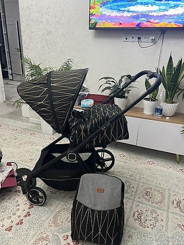 Прогулочная коляска NEW LUX с полным комплектом аксессуаров. Основные