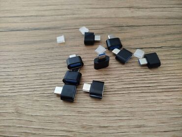 Printerlər: Flash kart < 2 GB, USB Micro, Yeni