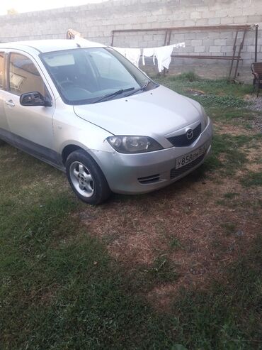 экономичная машина: Mazda Demio: 2003 г., 1.3 л, Механика, Бензин, Хэтчбэк