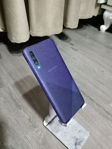 samsung c5610: Samsung Galaxy A30s, 128 GB, rəng - Bənövşəyi, İki sim kartlı — 2