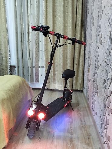 Электротранспорт: Elektrik skuter – oturacaqlı, güclu işıqlandırma və iri təkərlər — 1