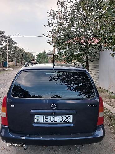 Продажа авто: Opel Astra Caravan (universal), mavi rəng. - Kuzov: universal, dam — 8