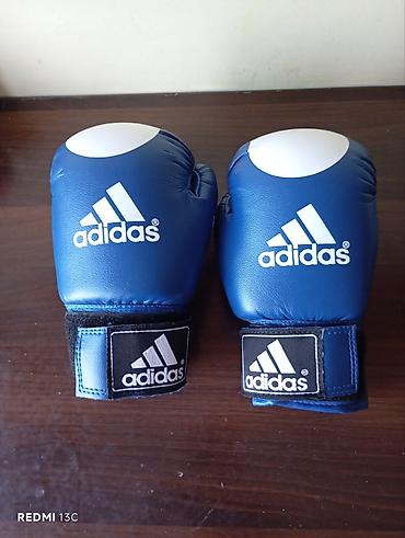 İdman və istirahət: Orijinal Adidas uşaq boks əlcəkləri satılır. Ölçüsü 4 oz (4-6 yaş — 1