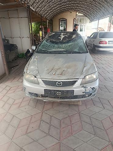 Mazda: Mazda 323: 2002 г., 1.6 л, Механика, Бензин, Седан — 1