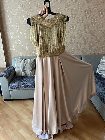 klassik geyim: 850 azna tikdirilib.Nerimanovda moda evinde. 1 defe geynilib. Matirali — 3