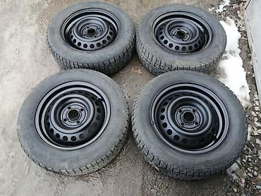 jas: Диски R14 с зимними шинами 185/65/14 "Maxxis", разболтовка дисков — 1