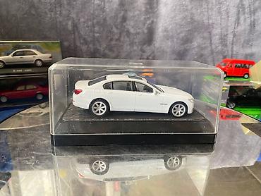 Avtomobil modelləri: Коллекционная модель BMW 750i F02 white 2008 RASTAR Scale 1:43 Art — 12